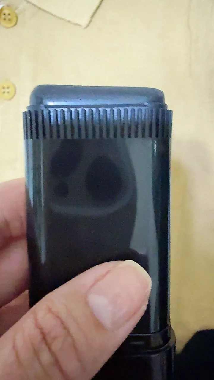 Customer unboxing the Hair Dye Comb
